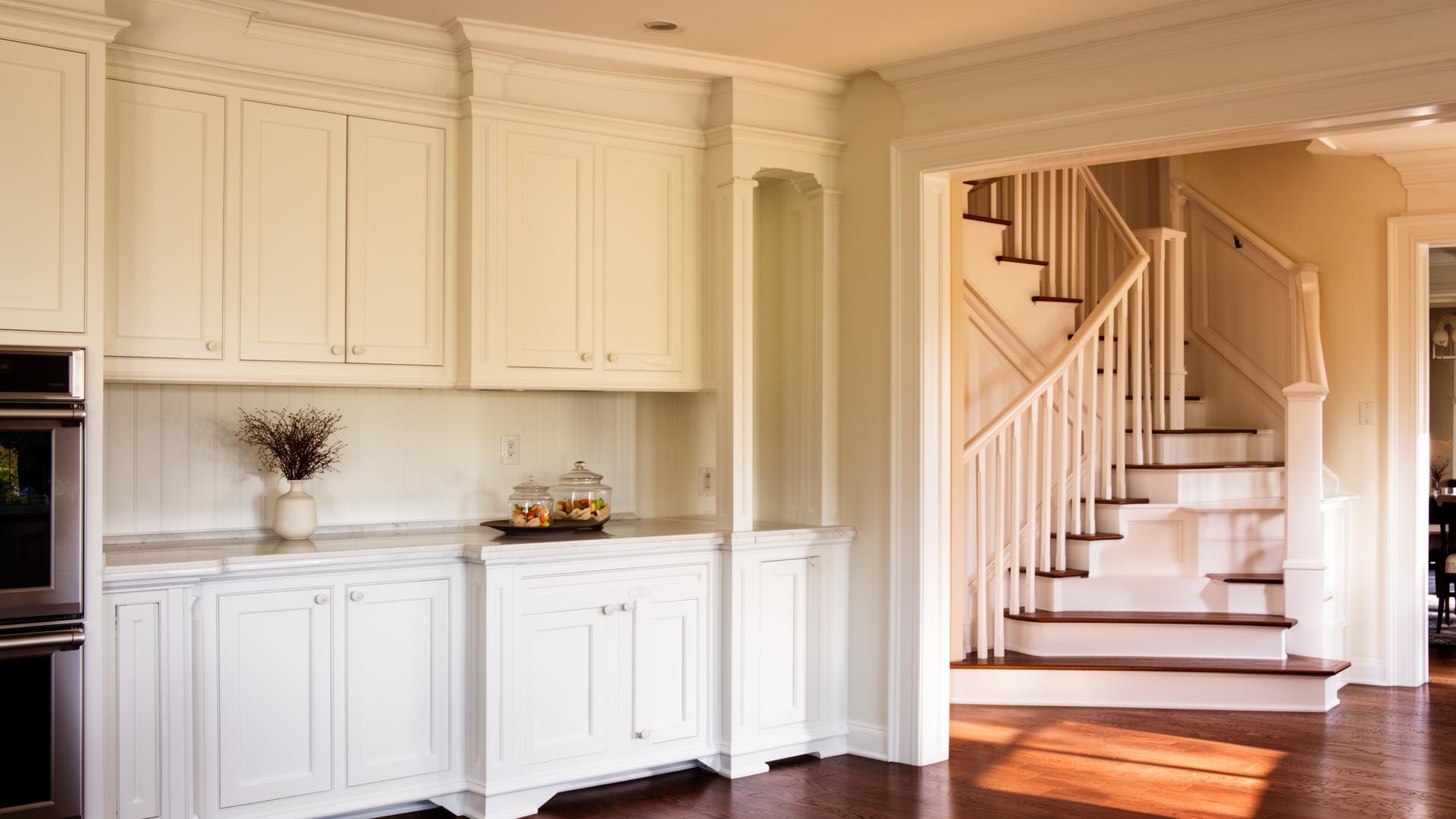 Freshly painted wood cabinets and trim in Edina, MN by JVN Exteriors
