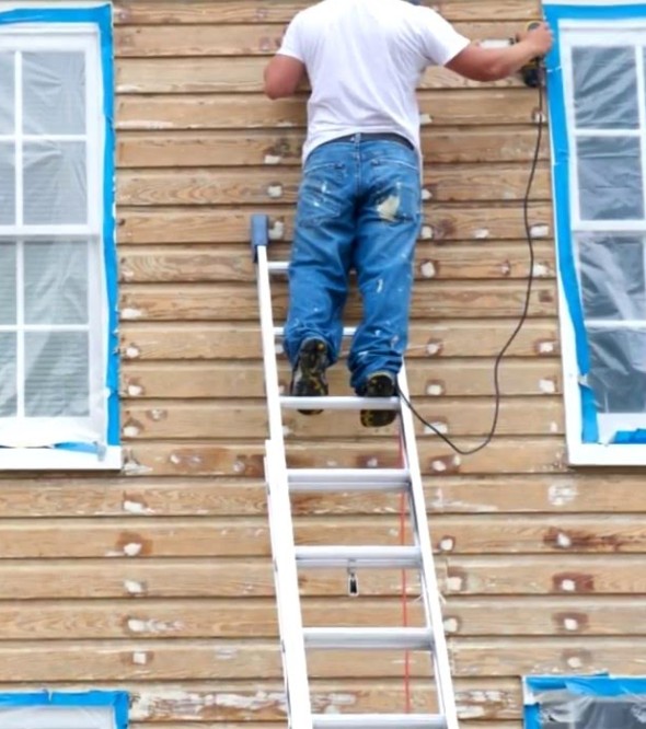 Exterior paint prep work in Edina, MN - scraping, sanding, and priming siding before paint