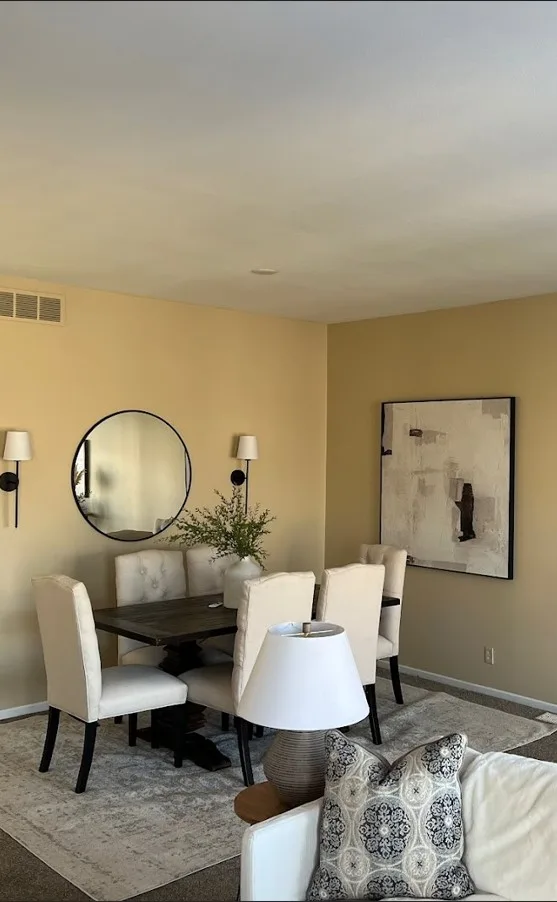Freshly painted interior living room of an Edina, MN home with neutral walls and crisp white trim