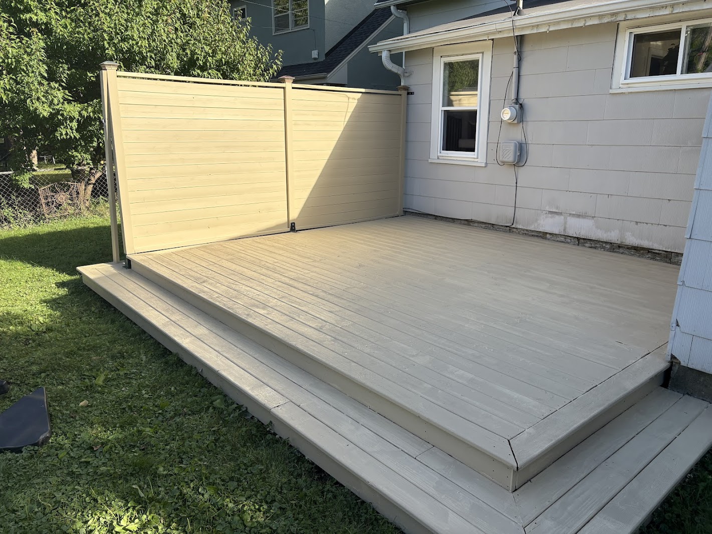 Solid-color painted deck surface on an Edina, MN home