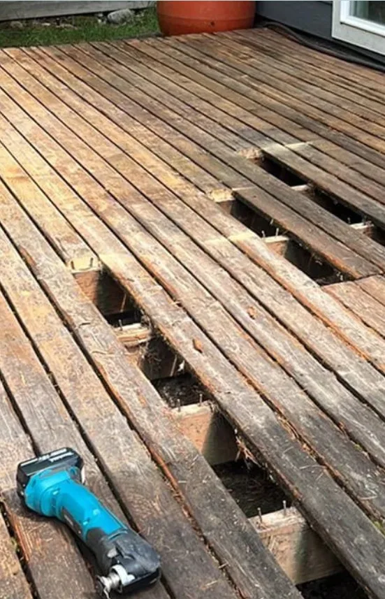 Replacing a damaged deck board during a refinishing project in Edina, MN